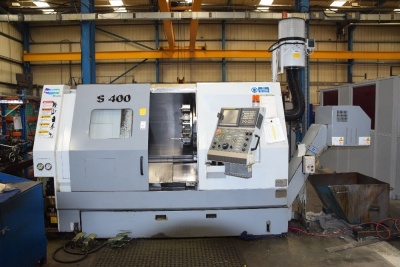 Doosan S400 slant bed CNC lathe with integrated filter mist system, 2 workbenches and a quantity of tooling S/N LSF 1025 (2006) (A Method Statement and Risk Assessment must be provided, reviewed and approved by the Auctioneer prior to any removal work com