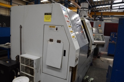 Doosan S400 slant bed CNC lathe with integrated filter mist system, 2 workbenches and a quantity of tooling S/N LSF 1025 (2006) (A Method Statement and Risk Assessment must be provided, reviewed and approved by the Auctioneer prior to any removal work com - 5