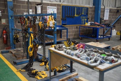 Large quantity of lifting chains, shackles, eyes and plate clamps with racks (Bay 3)