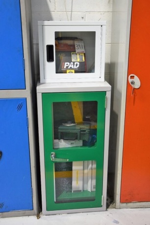 CU Medical systems IPAD portable defibrillator and a fist aid cabinet and contents (Coridoor)