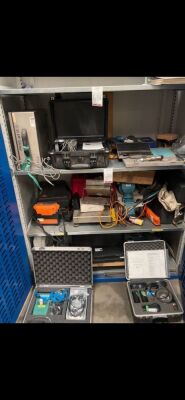 Metal cupboard containing a variety of calibration equipment, PIG testing/tracking equipment, Chart recorders and Gas testers