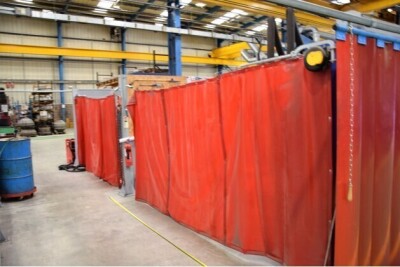 Kemper Acoustic Partition Welding Wall System, 9.6m x 7.9m approx With a 4.20m approx Wall Divider Making Two Separate Welding Booths With Red PVC Curtains - 4