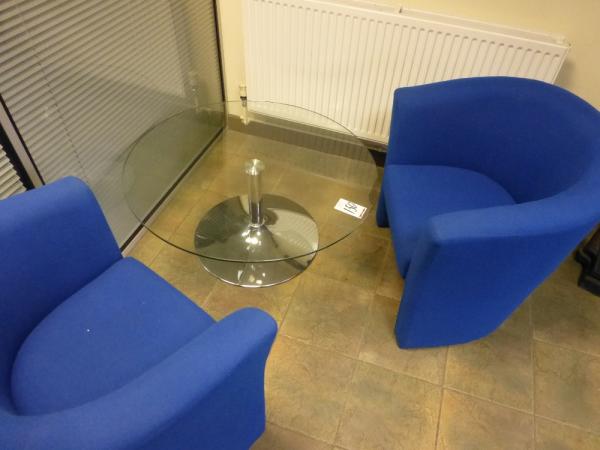 950 mm diameter glass topped occasional table with 2 blue twead upholstered tub arm chairs