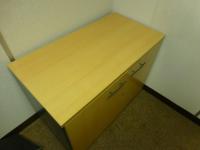Furniture to private office 2 to include 2x (1800 mm x 1200 mm) beech effect workstations with 2x three draw pedestals, 1.7 m high beech effect double door cupboard, 730 mm high beech effect double door cupboard and 2x green twead swivel arm chairs - 3