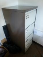 Furniture to private office 1 to include, 1800 mm x 1200 mm beech effect workstation with three draw pedestal, 1.7 m high beech effect double door cupboard, 730 mm high beech effect double door cupboard, Vickers brown/cream steel 4 draw filing cabinet, bl - 4